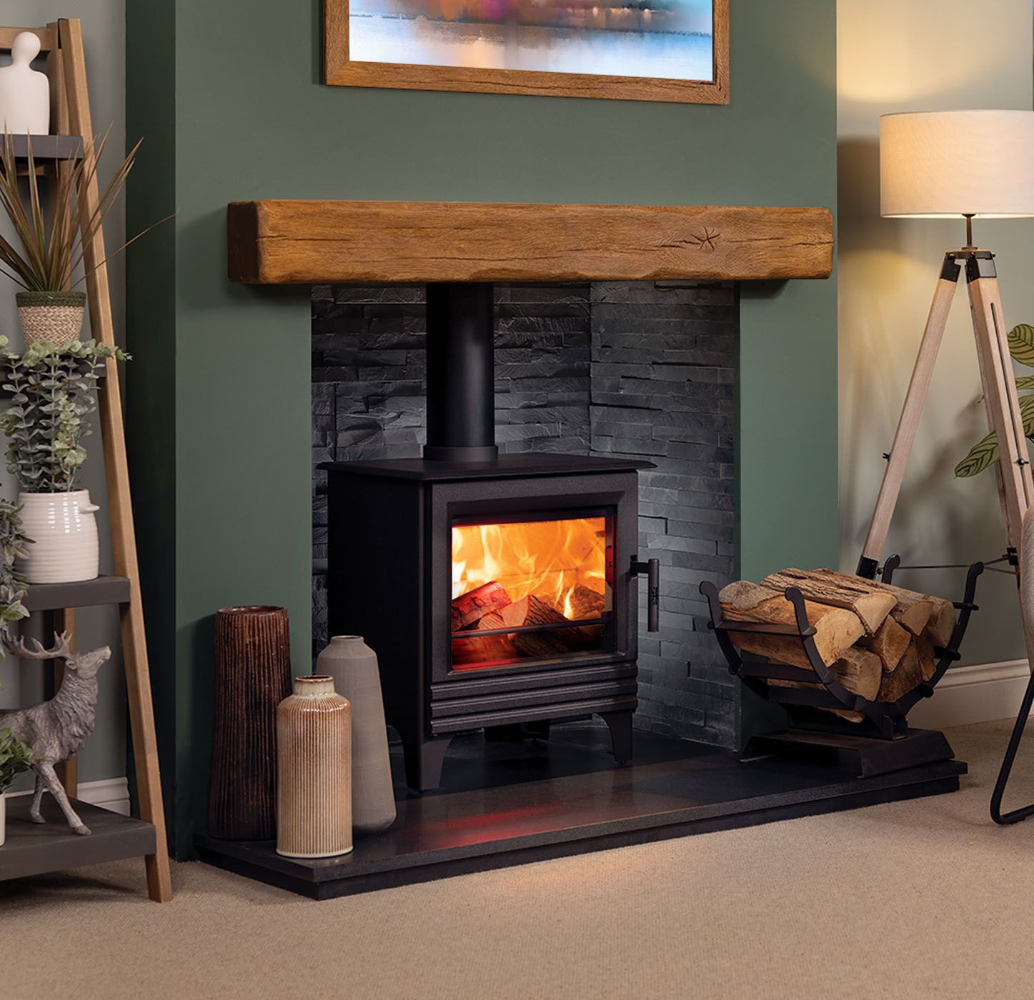 Sandstone fireplace with exposed beam and wood burning stove