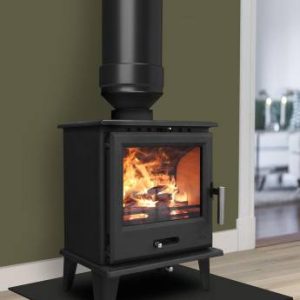 Saltfire Classic black wood burning stove with flue pipe on a black hearth plate